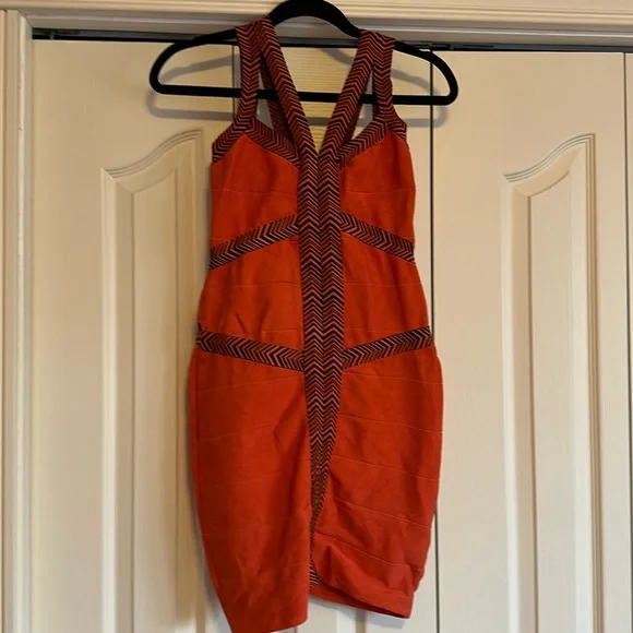 59 BEBE | Orange And Black Bandage Dress - Picture 1 of 3